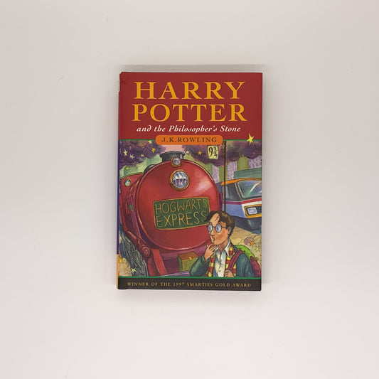 Harry Potter and the Philosopher's Stone (Harry Potter #1) - J.K. Rowling