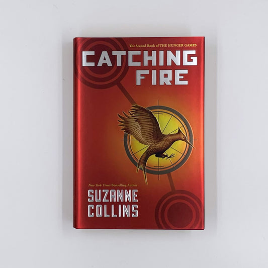 Catching Fire (The Hunger Games #2) - Suzanne Collins